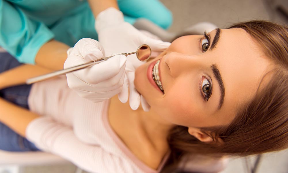 Restoring Teeth Via Bonding Before or During Orthodontic Treatment